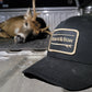 Black Board & Bow Logo Patch Trucker Hat