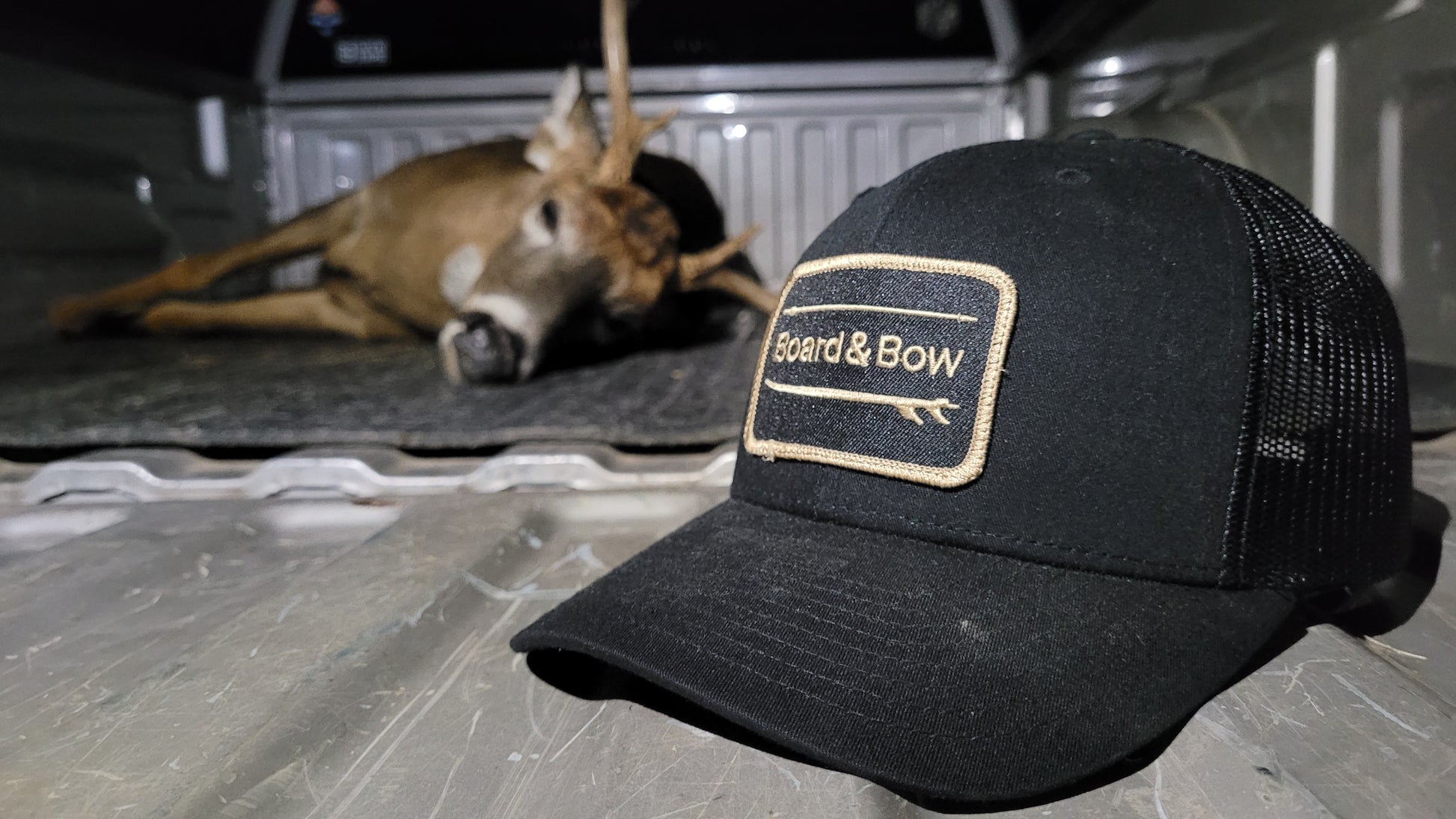 Black Board & Bow Logo Patch Trucker Hat